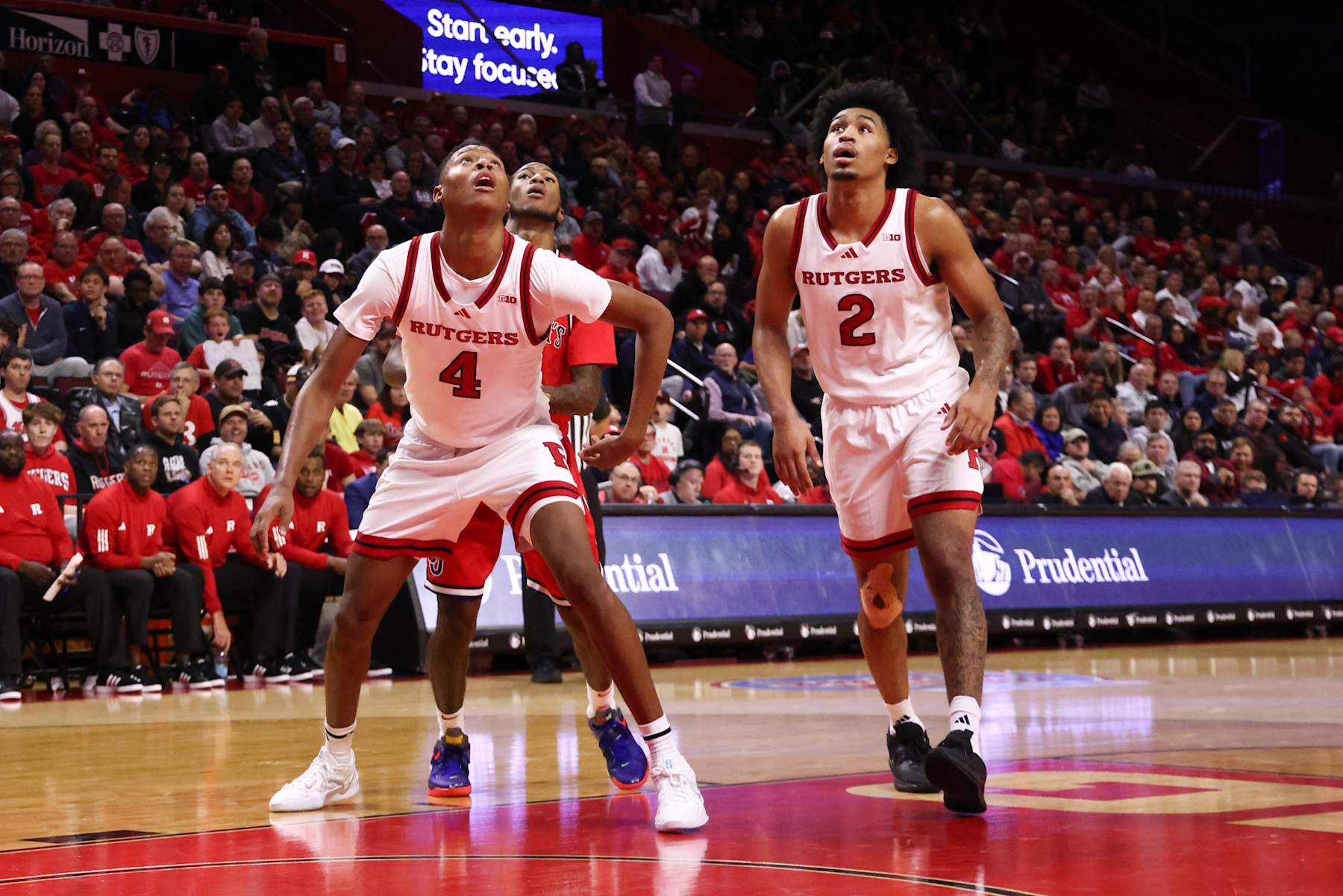 Rutgers' Ace Bailey (4) and Dylan Harper (2)