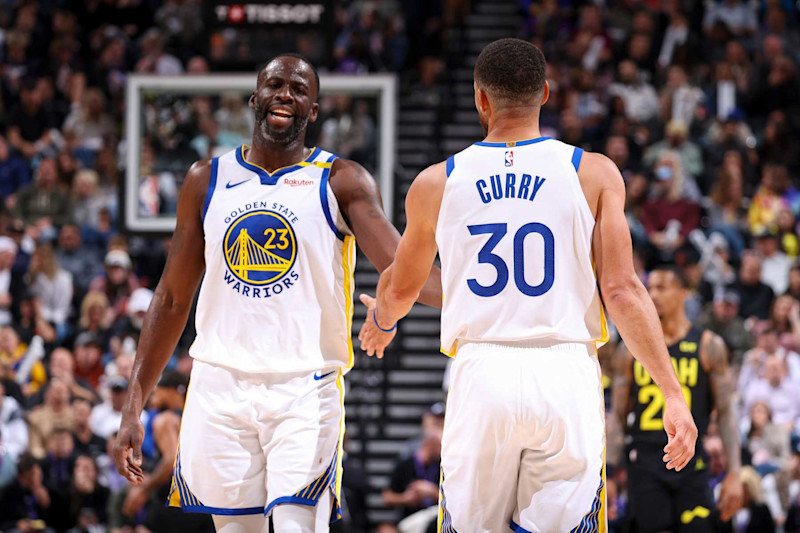 SALT LAKE CITY, UT - OCTOBER 25: Draymond Green #23 and Stephen Curry #30 of the Golden State Warriors high five during the game on October 25, 2024 at Delta Center in Salt Lake City, Utah. NOTE TO USER: User expressly acknowledges and agrees that, by downloading and or using this Photograph, User is consenting to the terms and conditions of the Getty Images License Agreement. Mandatory Copyright Notice: Copyright 2024 NBAE (Photo by Melissa Majchrzak/NBAE via Getty Images)