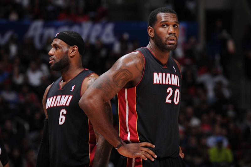 LOS ANGELES, CA - FEBRUARY 5: LeBron James #6 and Greg Oden #20 of the Miami Heat look on against the Los Angeles Clippers at Staples Center on February 5, 2014 in Los Angeles, California. NOTE TO USER: User expressly acknowledges and agrees that, by downloading and/or using this Photograph, user is consenting to the terms and conditions of the Getty Images License Agreement. Mandatory Copyright Notice: Copyright 2014 NBAE (Photo by Andrew D. Bernstein/NBAE via Getty Images)