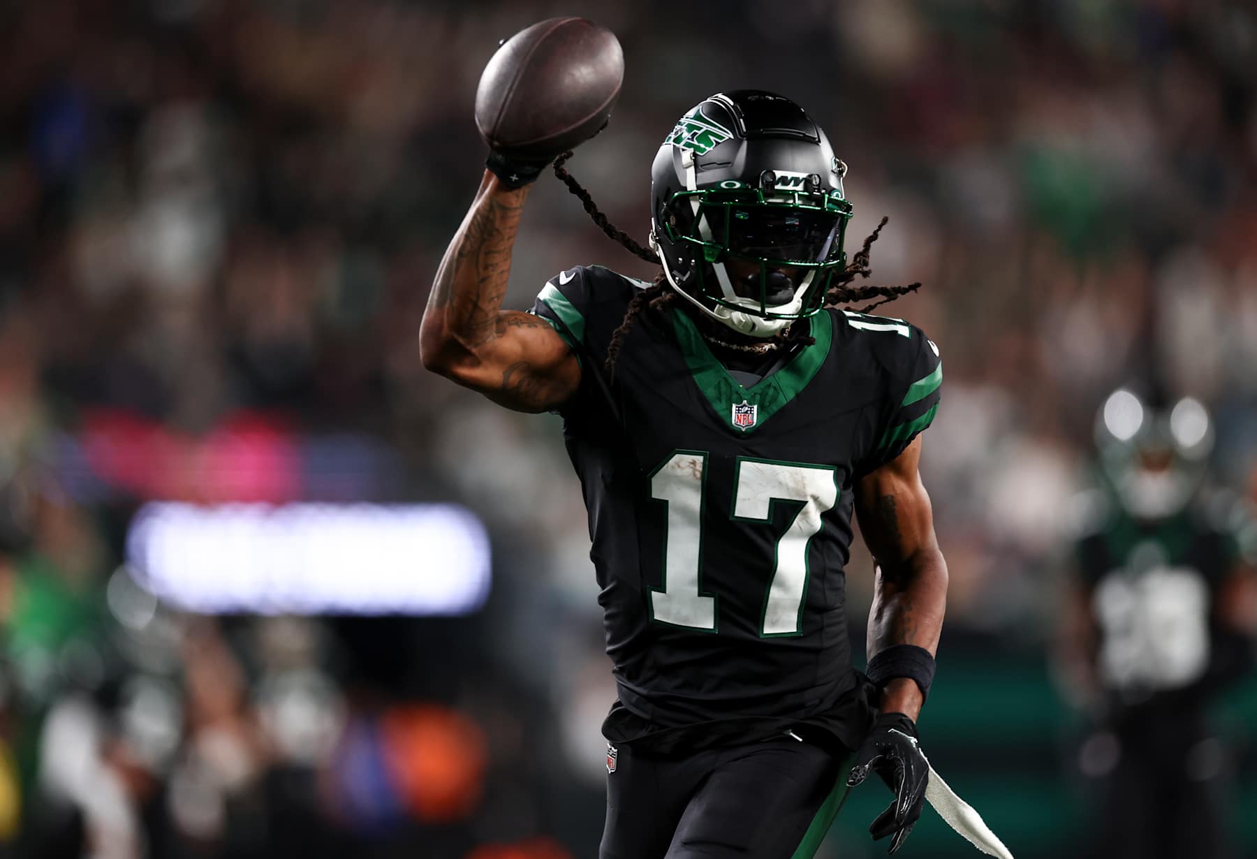 EAST RUTHERFORD, NEW JERSEY - OCTOBER 31: Davante Adams #17 of the New York Jets carries the ball to score a touchdown during the second half of an NFL football game against the Houston Texans, at MetLife Stadium on October 31, 2024 in East Rutherford, New Jersey. (Photo by Kevin Sabitus/Getty Images)