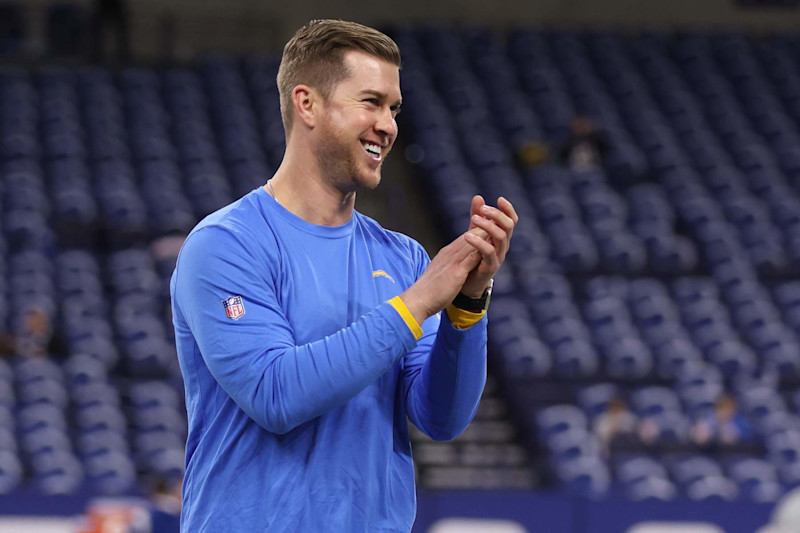 INDIANAPOLIS, IN - DECEMBER 26: Los Angeles Chargers offensive quality control coach Chandler Whitmer stands on the field prior to an NFL football game against the Indianapolis Colts at Lucas Oil Stadium on December 26, 2022 in Indianapolis, Indiana. (Photo by Perry Knotts/Getty Images)