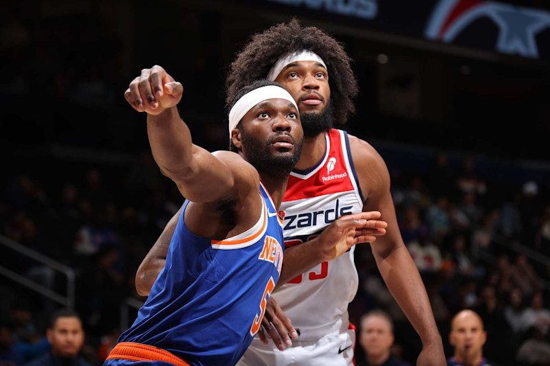 WASHINGTON, DC -  OCTOBER 18: Precious Achiuwa #5 of the New York Knicks boxes out during the game against the Washington Wizards on October 18, 2024 at Capital One Arena in Washington, DC. NOTE TO USER: User expressly acknowledges and agrees that, by downloading and or using this Photograph, user is consenting to the terms and conditions of the Getty Images License Agreement. Mandatory Copyright Notice: Copyright 2024 NBAE (Photo by Stephen Gosling/NBAE via Getty Images)