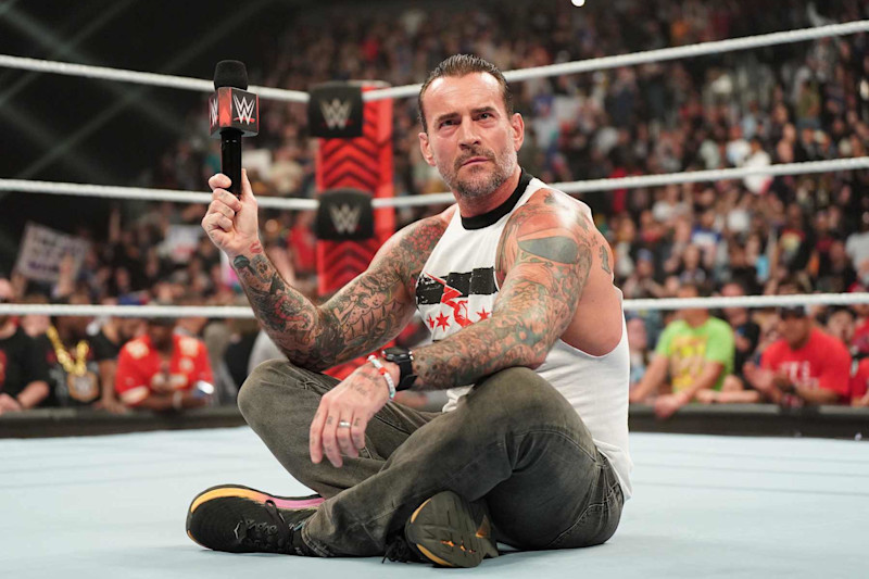 KANSAS CITY, MISSOURI - APRIL 29: CM Punk drops a Pipe Bomb at T-Mobile Center on April 29, 2024 in Kansas City, Missouri.  (Photo by WWE/Getty Images)