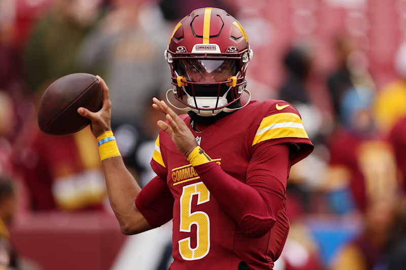 LANDOVER, MARYLAND - NOVEMBER 10: Jayden Daniels #5 of the Washington Commanders warms up prior to a game against the Pittsburgh Steelers at Northwest Stadium on November 10, 2024 in Landover, Maryland. (Photo by Scott Taetsch/Getty Images)