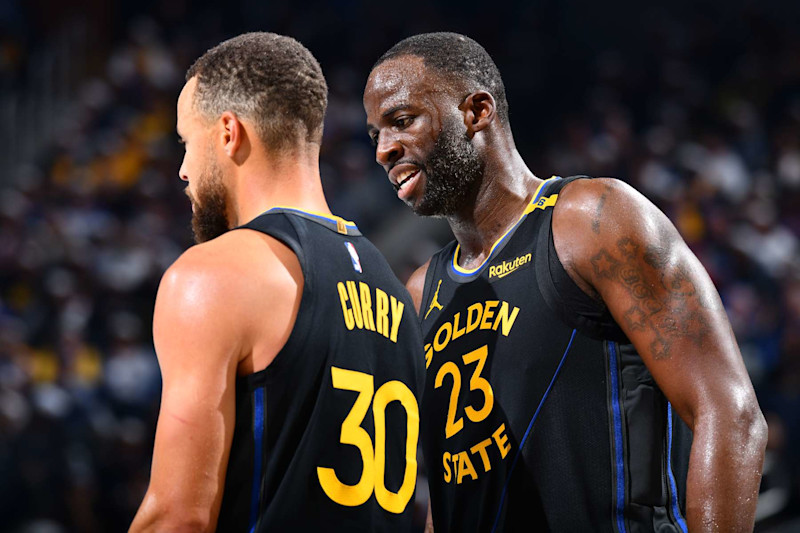 PHOENIX, AZ - NOVEMBER 12: Stephen Curry #30 and Draymond Green #23 of the Golden State Warriors looks on during the game against the Dallas Mavericks during the Emirates NBA Cup game on November 12, 2024 at Footprint Center in Phoenix, Arizona. NOTE TO USER: User expressly acknowledges and agrees that, by downloading and or using this photograph, user is consenting to the terms and conditions of the Getty Images License Agreement. Mandatory Copyright Notice: Copyright 2024 NBAE (Photo by Barry Gossage/NBAE via Getty Images)