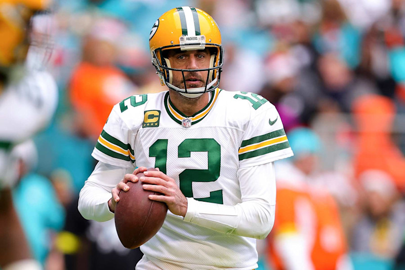 MIAMI GARDENS, FLORIDA - DECEMBER 25: Aaron Rodgers #12 of the Green Bay Packers throws a pass against the Miami Dolphins during the second quarter of the game at Hard Rock Stadium on December 25, 2022 in Miami Gardens, Florida. (Photo by Megan Briggs/Getty Images)