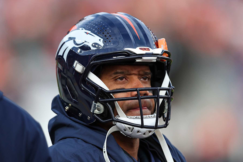 DENVER, CO - DECEMBER 31: Russell Wilson #3 of the Denver Broncos looks on from the sideline during an NFL football game against the Los Angeles Chargers at Empower Field at Mile High on December 31, 2023 in Denver, Colorado. (Photo by Perry Knotts/Getty Images)