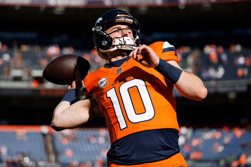 DENVER, COLORADO - NOVEMBER 17: Quarterback Bo Nix #10 of the Denver Broncos warms up prior to an NFL football game against the Atlanta Falcons, at Empower Field at Mile High on November 17, 2024 in Denver, Colorado. (Photo by Brooke Sutton/Getty Images)