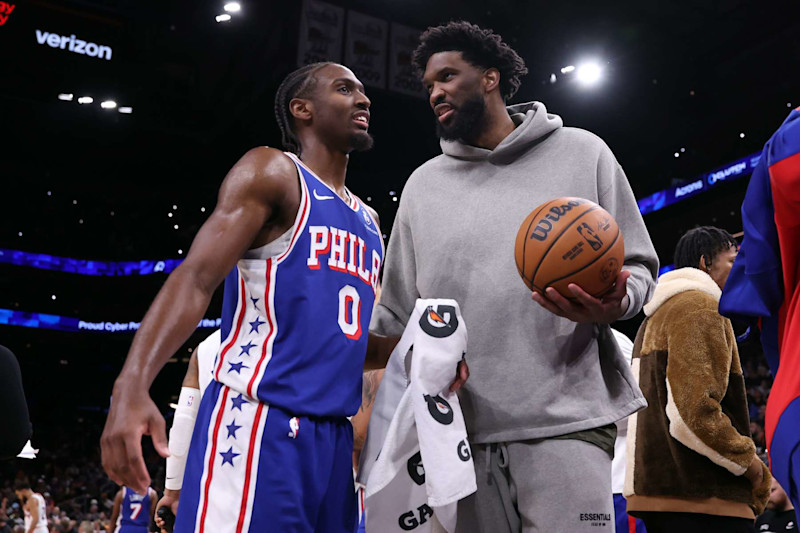 PHOENIX, ARIZONA - NOVEMBER 04: Joel Embiid #21 of the Philadelphia 76ers talks with Tyrese Maxey #0 during a time out during the game against the Phoenix Suns at Footprint Center on November 04, 2024 in Phoenix, Arizona. The Suns defeated the 76ers 118-116. NOTE TO USER: User expressly acknowledges and agrees that, by downloading and or using this photograph, User is consenting to the terms and conditions of the Getty Images License Agreement.  (Photo by Chris Coduto/Getty Images)