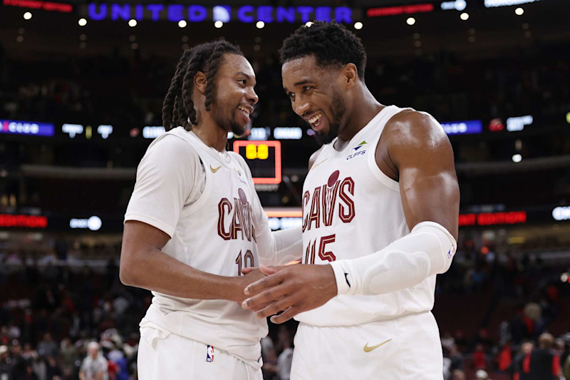 CHICAGO, ILLINOIS - NOVEMBER 11: Darius Garland (L) #10 of the Cleveland Cavaliers and Donovan Mitchell #45 of the Cleveland Cavaliers celebrate their win over the Chicago Bulls at the United Center on November 11, 2024 in Chicago, Illinois. NOTE TO USER: User expressly acknowledges and agrees that, by downloading and or using this photograph, User is consenting to the terms and conditions of the Getty Images License Agreement. (Photo by Geoff Stellfox/Getty Images)