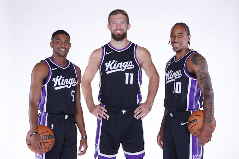 SACRAMENTO, CA - SEPTEMBER 30: De'Aaron Fox #5, Domantas Sabonis #11 and DeMar DeRozan #10 of the Sacramento Kings poses for a portrait during NBA Media Day on September 30, 2024 at the Golden 1 Center in Sacramento, California. NOTE TO USER: User expressly acknowledges and agrees that, by downloading and/or using this Photograph, user is consenting to the terms and conditions of the Getty Images License Agreement. Mandatory Copyright Notice: Copyright 2024 NBAE (Photo by Rocky Widner/NBAE via Getty Images)