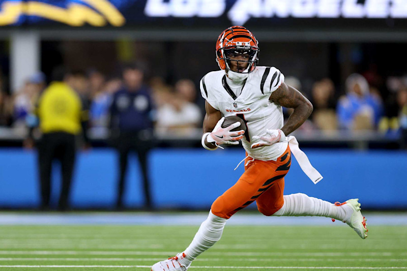 INGLEWOOD, CALIFORNIA - NOVEMBER 17: Ja'Marr Chase #1 of the Cincinnati Bengals runs after his catch during a 34-27 loss to the Los Angeles Chargers at SoFi Stadium on November 17, 2024 in Inglewood, California. (Photo by Harry How/Getty Images)