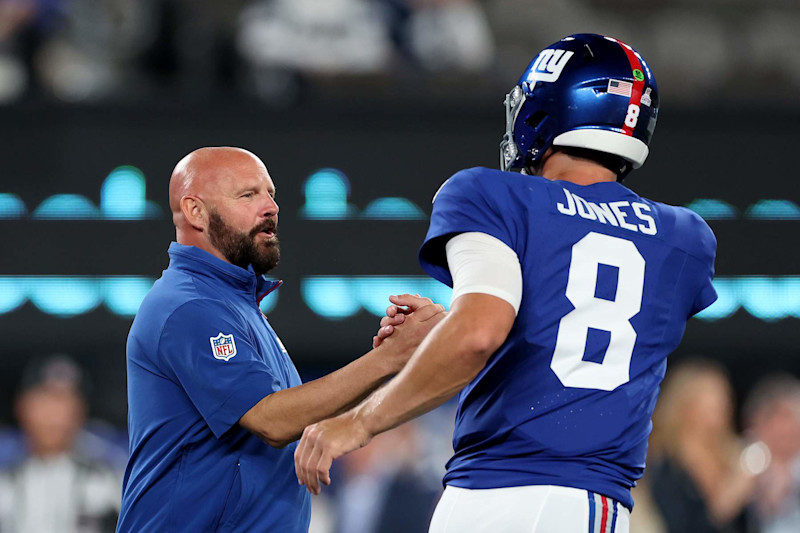 EAST RUTHERFORD, NEW JERSEY - SEPTEMBER 26: Brian Daboll head coach of the New York Giants talks with Daniel Jones #8 prior to the game at against the Dallas Cowboys MetLife Stadium on September 26, 2024 in East Rutherford, New Jersey. (Photo by Luke Hales/Getty Images)