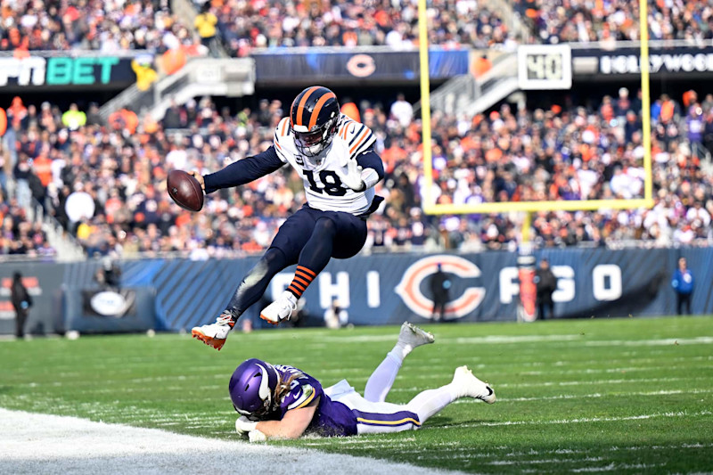 CHICAGO, ILLINOIS - NOVEMBER 24: Caleb Williams #18 of the Chicago Bears is forced out of bounds during the first quarter against the Minnesota Vikings at Soldier Field on November 24, 2024 in Chicago, Illinois. (Photo by Quinn Harris/Getty Images)