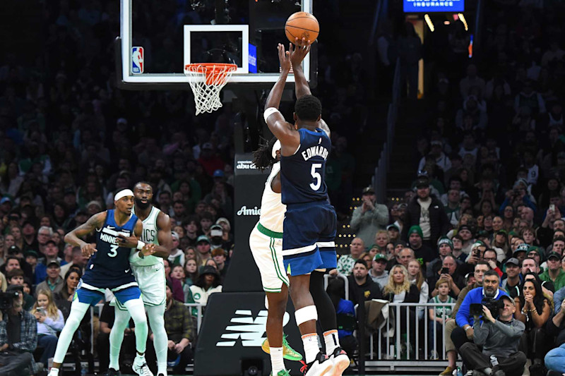 BOSTON, MA - NOVEMBER 24: Anthony Edwards #5 of the Minnesota Timberwolves three point basket during the game against the Boston Celtics on November 24, 2024 at the TD Garden in Boston, Massachusetts. NOTE TO USER: User expressly acknowledges and agrees that, by downloading and or using this photograph, User is consenting to the terms and conditions of the Getty Images License Agreement. Mandatory Copyright Notice: Copyright 2024 NBAE(Photo by Brian Babineau/NBAE via Getty Images)