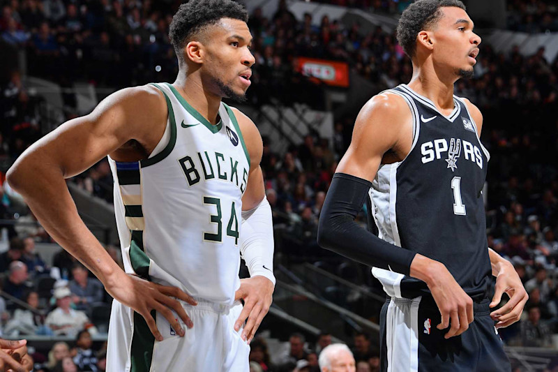 SAN ANTONIO, TX - JANUARY 4:  Giannis Antetokounmpo #34 of the Milwaukee Bucks and Victor Wembanyama #1 of the San Antonio Spurs look on during the game on January 4, 2024 at the Frost Bank Center in San Antonio, Texas. NOTE TO USER: User expressly acknowledges and agrees that, by downloading and or using this photograph, user is consenting to the terms and conditions of the Getty Images License Agreement. Mandatory Copyright Notice: Copyright 2024 NBAE (Photos by Michael Gonzales/NBAE via Getty Images)