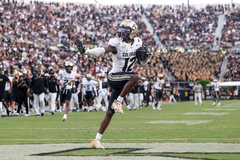 ORLANDO, FL - SEPTEMBER 28: Cornerback Travis Hunter #12 of the Colorado Buffaloes hits the Heisman Pose after making an interception during the game against the UCF Knights at FBC Mortgage Stadium on September 28, 2024 in Orlando, Florida. The Buffaloes defeated the Knights 48 to 21. (Photo by Don Juan Moore/Getty Images)