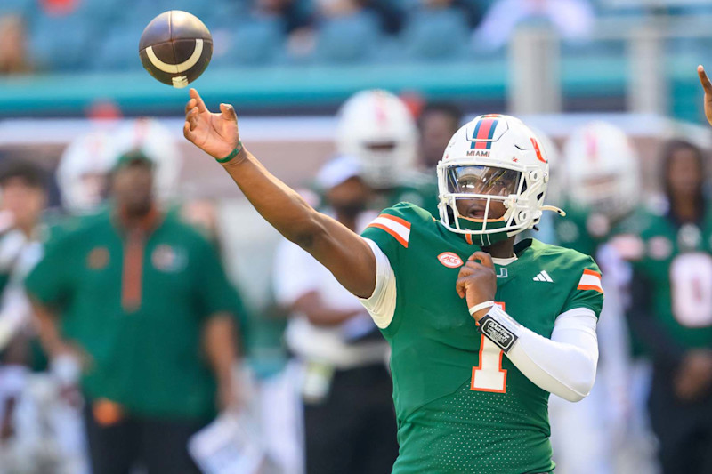 MIAMI GARDENS, FL - NOVEMBER 23: Miami quarterback Cam Ward (1) throws the ball during the college football game between the Wake Forest Deacon Demons and the University of Miami Hurricanes on November 23, 2024 at the Hard Rock Stadium in Miami Gardens, FL. (Photo by Doug Murray/Icon Sportswire via Getty Images)