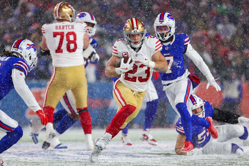 ORCHARD PARK, NEW YORK - DECEMBER 01: Christian McCaffrey #23 of the San Francisco 49ers runs the ball up the field in the first quarter of a game against the Buffalo Bills at Highmark Stadium on December 01, 2024 in Orchard Park, New York. (Photo by Timothy T Ludwig/Getty Images)