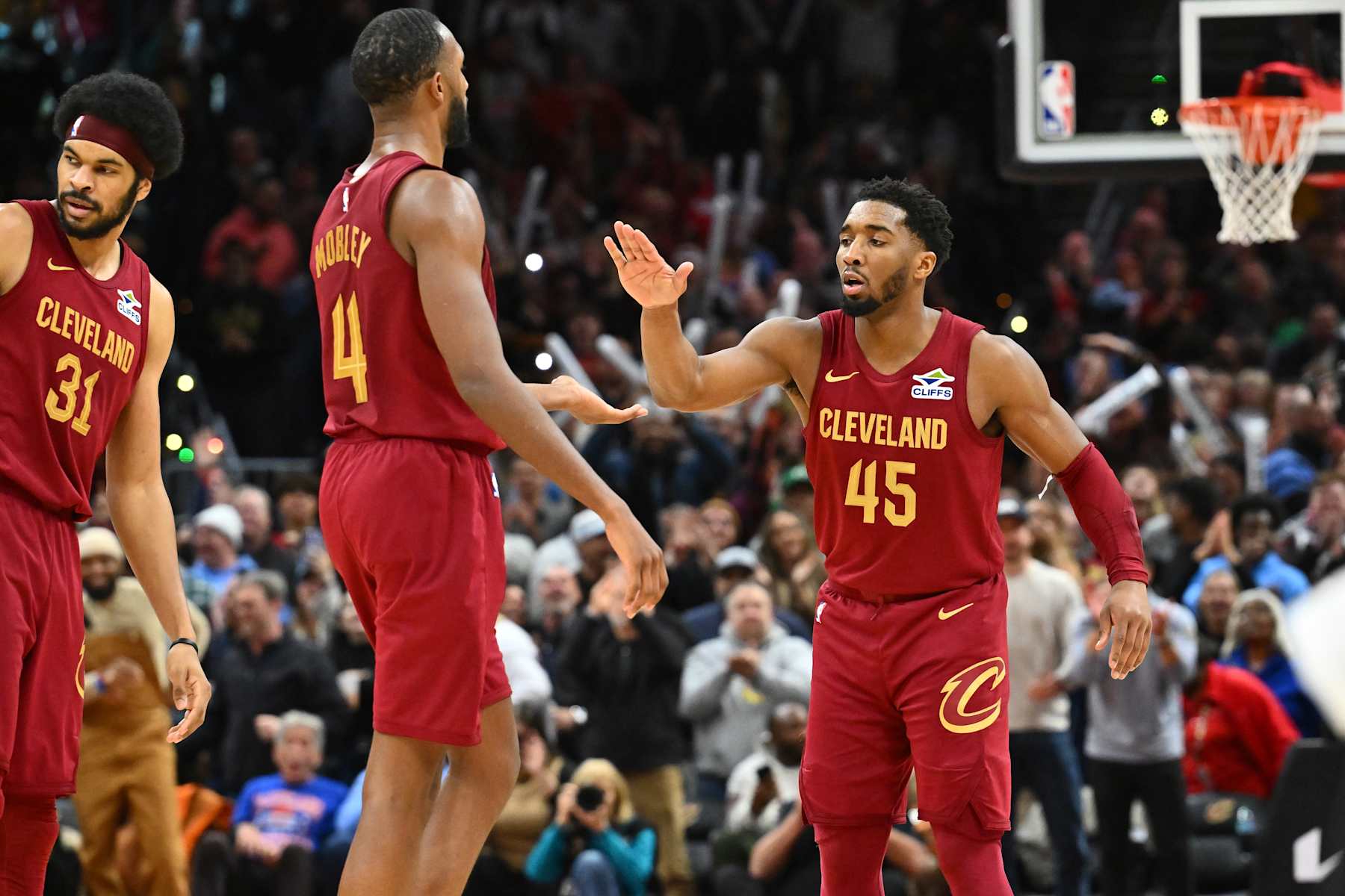 CLEVELAND, OHIO - DECEMBER 01: Evan Mobley #4 celebrates with Donovan Mitchell #45 of the Cleveland Cavaliers during the fourth quarter against the Boston Celtics at Rocket Mortgage Fieldhouse on December 01, 2024 in Cleveland, Ohio. The Cavaliers defeated the Celtics 115-111. NOTE TO USER: User expressly acknowledges and agrees that, by downloading and or using this photograph, User is consenting to the terms and conditions of the Getty Images License Agreement. (Photo by Jason Miller/Getty Images)