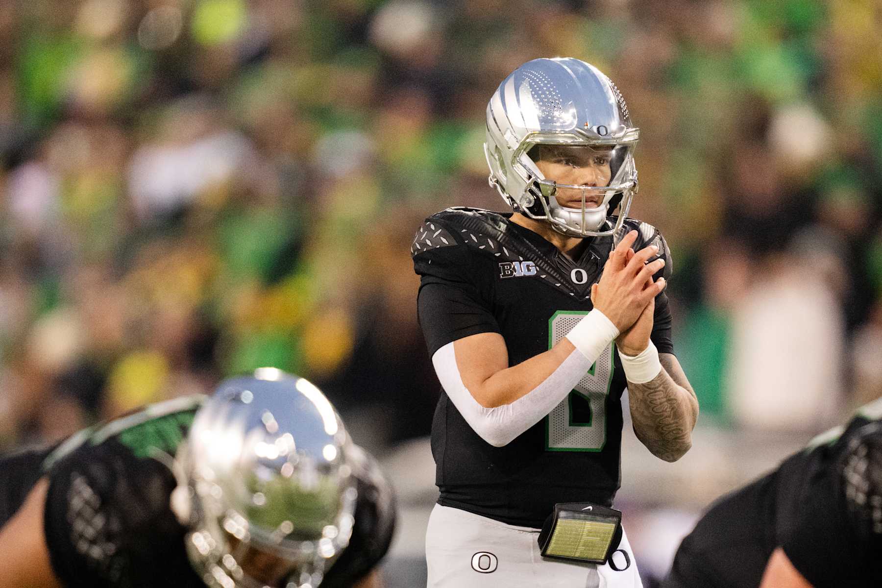 EUGENE, OREGON - NOVEMBER 30: Quarterback Dillon Gabriel #8 of the Oregon Ducks prepares for a snap during the first half of the game against the Washington Huskies at Autzen Stadium on November 30, 2024 in Eugene, Oregon. (Photo by Ali Gradischer/Getty Images)
