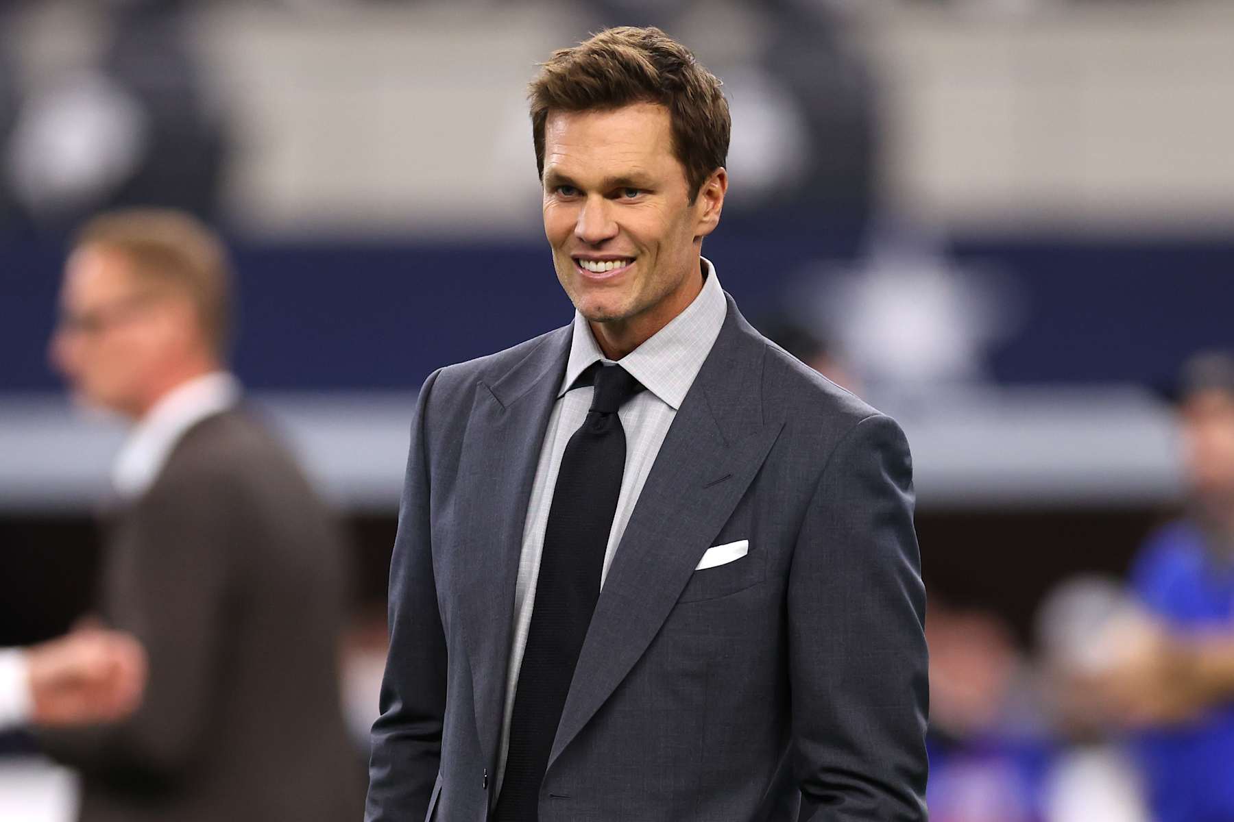 ARLINGTON, TEXAS - NOVEMBER 28: Tom Brady looks on prior to the game between the Dallas Cowboys and the New York Giants at AT&T Stadium on November 28, 2024 in Arlington, Texas. (Photo by Sam Hodde/Getty Images)