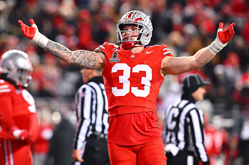 COLUMBUS, OHIO - DECEMBER 21: Jack Sawyer #33 of the Ohio State Buckeyes celebrates during the second quarter against the Tennessee Volunteers in the Playoff First Round Game at Ohio Stadium on December 21, 2024 in Columbus, Ohio.  (Photo by Jason Miller/Getty Images)