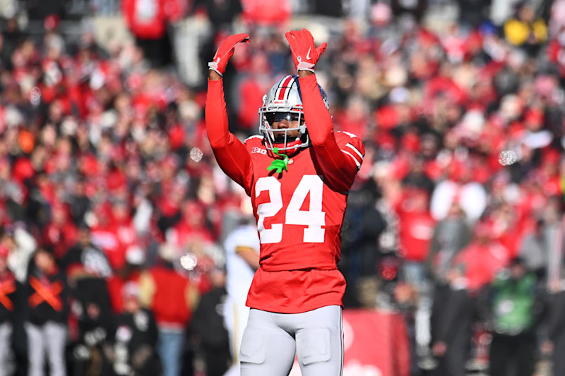 COLUMBUS, OHIO - NOVEMBER 30: Jermaine Mathews Jr. #24 of the Ohio State Buckeyes pumps up the crowd prior to the opening kickoff of a game against the Michigan Wolverines at Ohio Stadium on November 30, 2024 in Columbus, Ohio. (Photo by Ben Jackson/Getty Images)