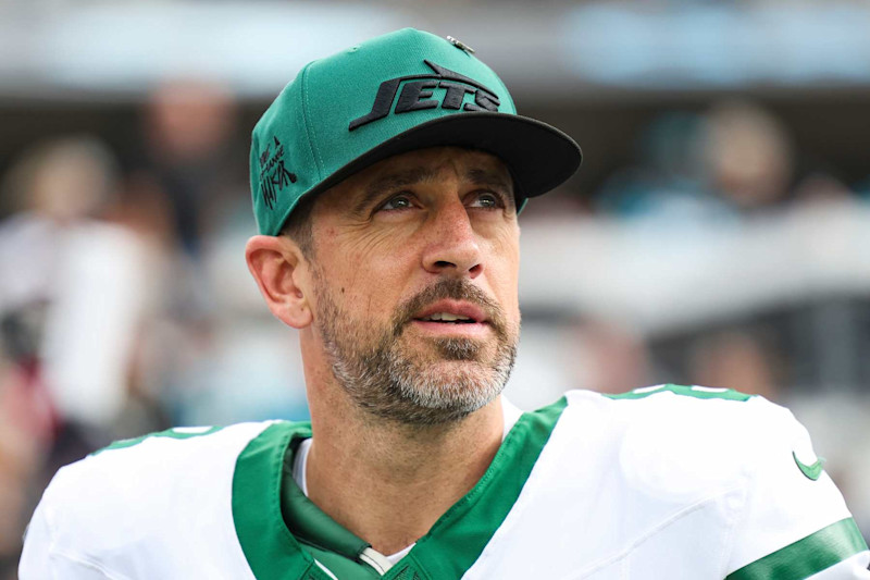 JACKSONVILLE, FLORIDA - DECEMBER 15: Aaron Rodgers #8 of the New York Jets looks on from the sideline prior to an NFL football game against the Jacksonville Jaguars at EverBank Stadium on December 15, 2024 in Jacksonville, FL. (Photo by Perry Knotts/Getty Images)