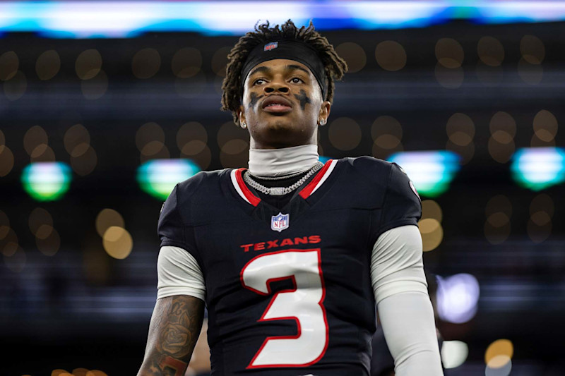 ARLINGTON, TEXAS - NOVEMBER 18: Tank Dell #3 of the Houston Texans looks on during an NFL Football game against the Dallas Cowboys at AT&T Stadium on November 18, 2024 in Arlington, Texas. (Photo by Michael Owens/Getty Images)