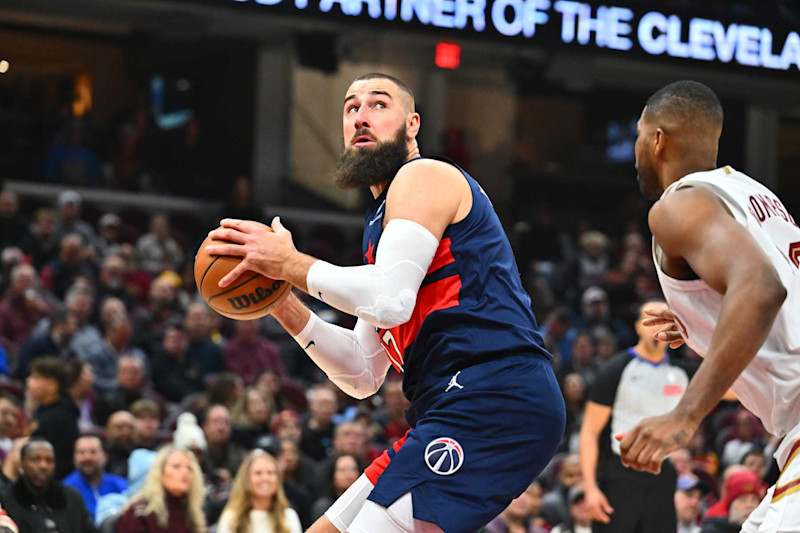 CLEVELAND, OHIO - DECEMBER 13: Jonas Valanciunas #17 of the Washington Wizards shoots over Tristan Thompson #13 of the Cleveland Cavaliers during the first quarter at Rocket Mortgage Fieldhouse on December 13, 2024 in Cleveland, Ohio. NOTE TO USER: User expressly acknowledges and agrees that, by downloading and or using this photograph, User is consenting to the terms and conditions of the Getty Images License Agreement. (Photo by Jason Miller/Getty Images)