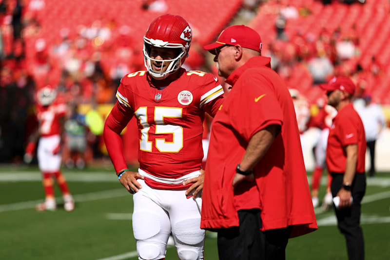 KANSAS CITY, MO - SEPTEMBER 15: Patrick Mahomes #15 of the Kansas City Chiefs talks with head coach Andy Reid prior to an NFL football game against the Cincinnati Bengals at GEHA Field at Arrowhead Stadium on September 15, 2024 in Kansas City, Missouri. (Photo by Kevin Sabitus/Getty Images)