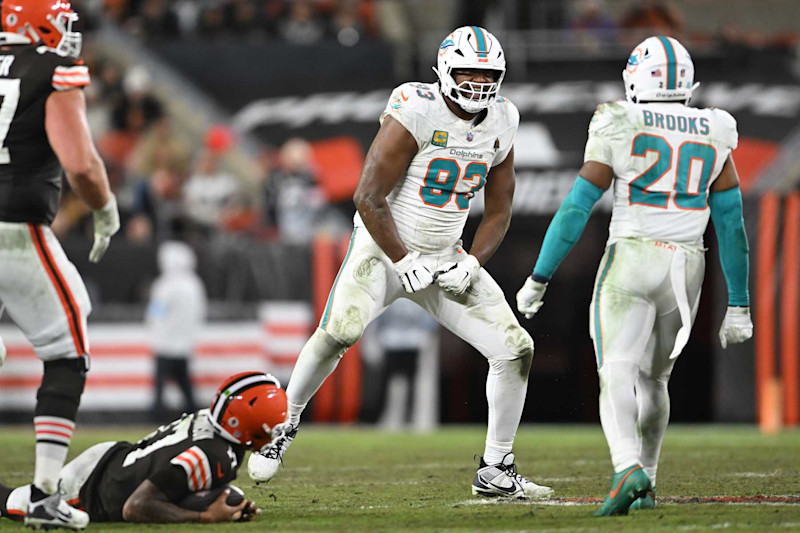 CLEVELAND, OHIO - DECEMBER 29: Calais Campbell #93 of the Miami Dolphins celebrates after tackling Dorian Thompson-Robinson #17 of the Cleveland Browns during the third quarter at Huntington Bank Field on December 29, 2024 in Cleveland, Ohio. (Photo by Nick Cammett/Getty Images)