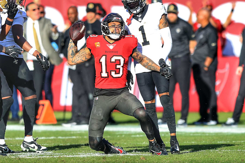 TAMPA, FL - JANUARY 05: Tampa Bay Buccaneers Wide Receiver Mike Evans (13) makes a catch on the last play of the game to get his 11th 1000 yard receiving season during the game between the New Orleans Saints and the Tampa Bay Buccaneers on January 05, 2025 at Raymond James Stadium in Tampa, Florida. (Photo by Cliff Welch/Icon Sportswire via Getty Images)