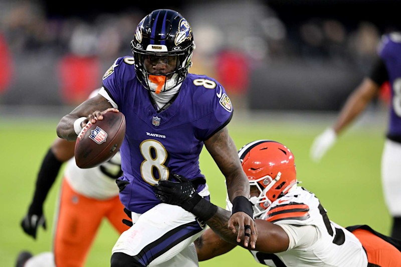 BALTIMORE, MARYLAND - JANUARY 04: Lamar Jackson #8 of the Baltimore Ravens runs with the ball against the Cleveland Browns at M&T Bank Stadium on January 04, 2025 in Baltimore, Maryland. (Photo by G Fiume/Getty Images)