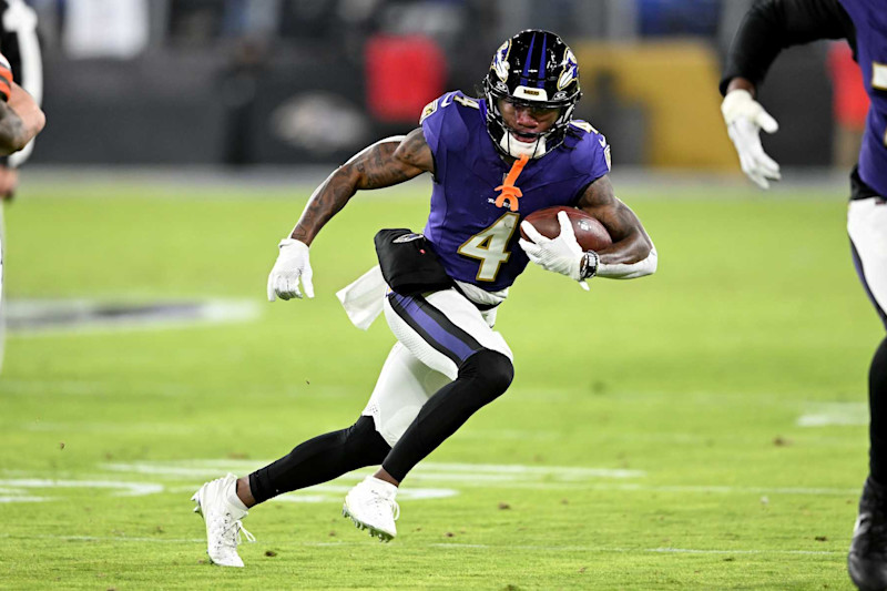 BALTIMORE, MARYLAND - JANUARY 04: Zay Flowers #4 of the Baltimore Ravens runs with the ball after making a catch against the Cleveland Browns at M&T Bank Stadium on January 04, 2025 in Baltimore, Maryland. (Photo by G Fiume/Getty Images)