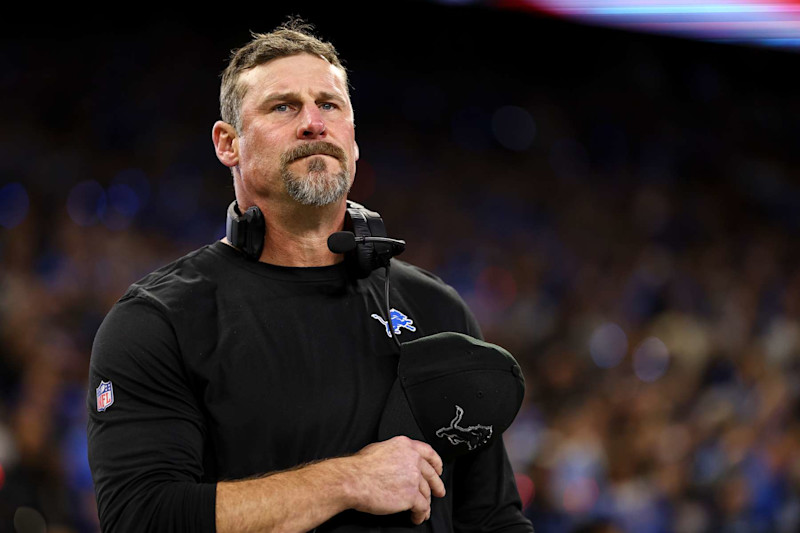 DETROIT, MICHIGAN - JANUARY 5: Head coach Dan Campbell of the Detroit Lions stands on the sidelines during the national anthem prior to an NFL football game against the Minnesota Vikings at Ford Field on January 5, 2025 in Detroit, Michigan. (Photo by Kevin Sabitus/Getty Images)