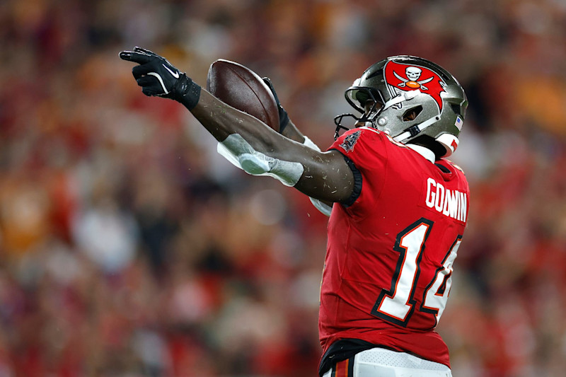 TAMPA, FLORIDA - OCTOBER 21: Chris Godwin #14 of the Tampa Bay Buccaneers reacts after making a first down during the second quarter against the Baltimore Ravens at Raymond James Stadium on October 21, 2024 in Tampa, Florida. (Photo by Mike Ehrmann/Getty Images)