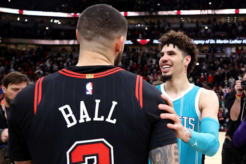 CHICAGO, ILLINOIS - JANUARY 17: Lonzo Ball #2 of the Chicago Bulls embraces LaMelo Ball #1 of the Charlotte Hornets after the game at the United Center on January 17, 2025 in Chicago, Illinois. NOTE TO USER: User expressly acknowledges and agrees that, by downloading and or using this photograph, user is consenting to the terms and conditions of the Getty Images License Agreement.  (Photo by Luke Hales/Getty Images)