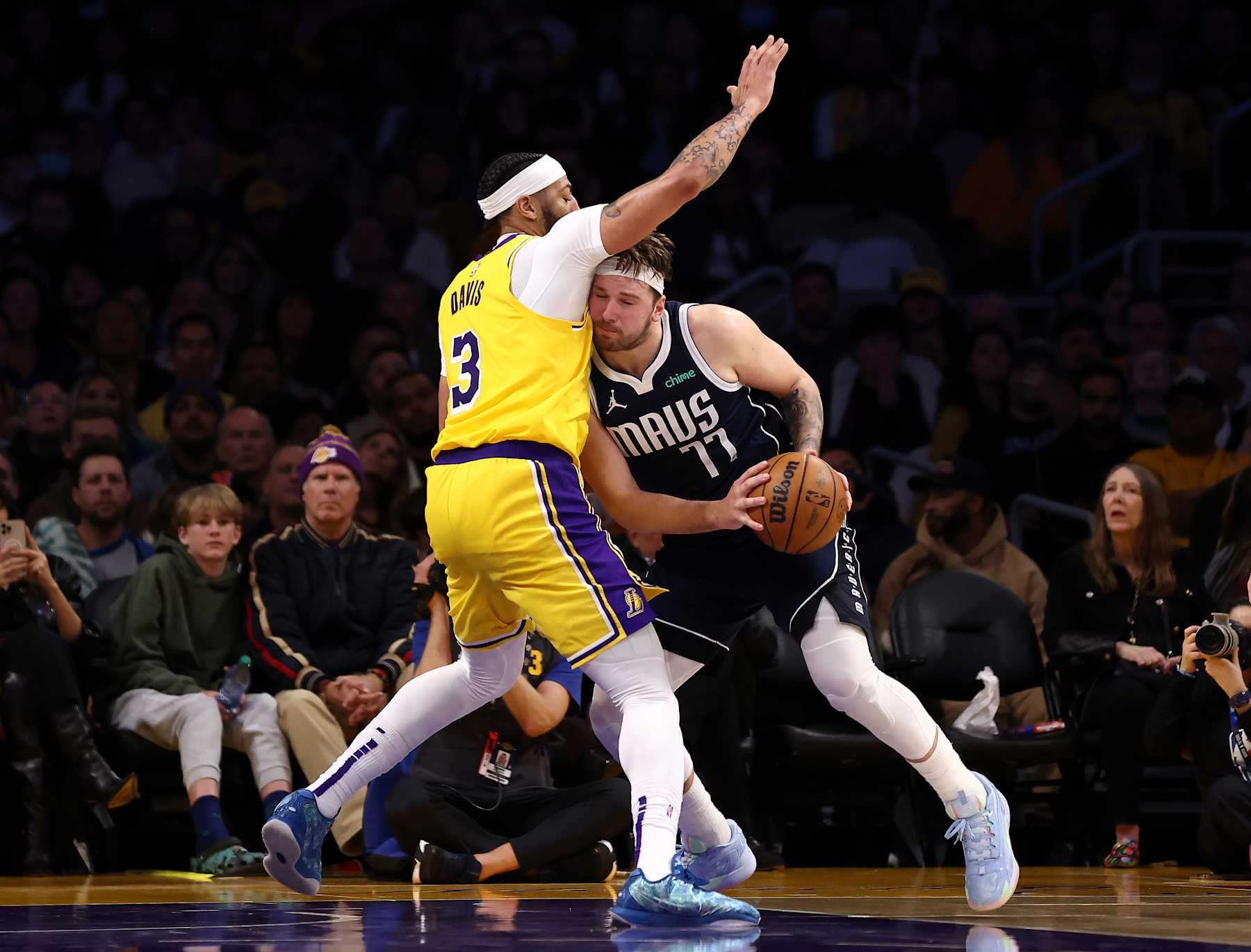 LOS ANGELES, CALIFORNIA - JANUARY 17: Luka Doncic #77 of the Dallas Mavericks drives to the basket against Anthony Davis #3 of the Los Angeles Lakers during the third quarter at Crypto.com Arena on January 17, 2024 in Los Angeles, California. NOTE TO USER: User expressly acknowledges and agrees that, by downloading and or using this photograph, User is consenting to the terms and conditions of the Getty Images License Agreement. (Photo by Katelyn Mulcahy/Getty Images)