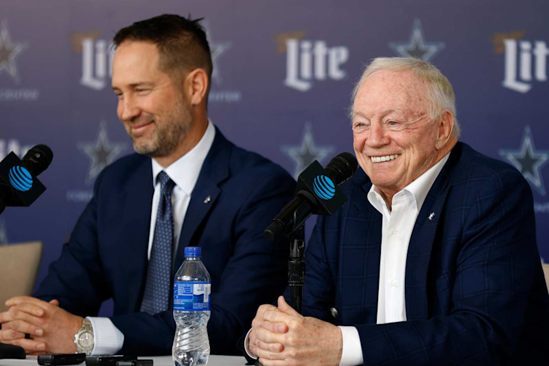 FRISCO, TEXAS - JANUARY 27:  New head coach of the Dallas Cowboys Brian Schottenheimer listens as team owner Jerry Jones talks during a press conference at The Star in Frisco on January 27, 2025 in Frisco, Texas. (Photo by Ron Jenkins/Getty Images)