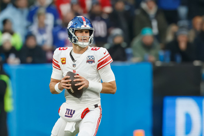 Munich, Germany - November 10: Daniel Jones of New York Giants controls the ball during the NFL Munich Game 2024 between New York Giants and Carolina Panthers at Allianz Arena on November 10, 2024 in Munich, Germany. (Photo by Mario Hommes/DeFodi Images via Getty Images)