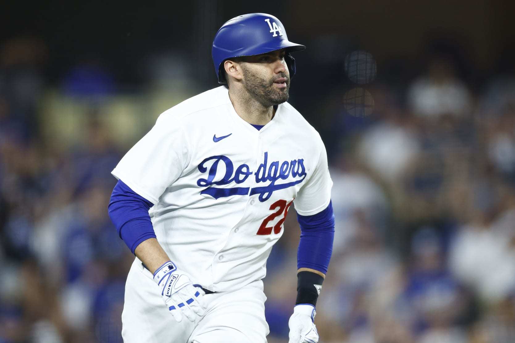 LOS ANGELES, CALIFORNIA - OCTOBER 09: J.D. Martinez #28 of the Los Angeles Dodgers hits a solo home run against the Arizona Diamondbacks during the fourth inning in Game Two of the Division Series at Dodger Stadium on October 09, 2023 in Los Angeles, California. (Photo by Ronald Martinez/Getty Images)