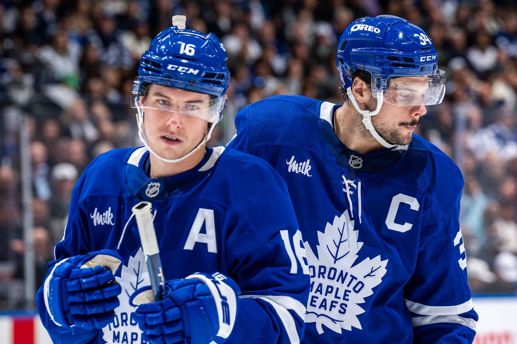 TORONTO, ON - OCTOBER 24: Auston Matthews #34 of the Toronto Maple Leafs and Mitch Marner #16 skate during a break in play against the St. Louis Blues at the Scotiabank Arena on October 24, 2024 in Toronto, Ontario, Canada. (Photo by Kevin Sousa/NHLI via Getty Images)