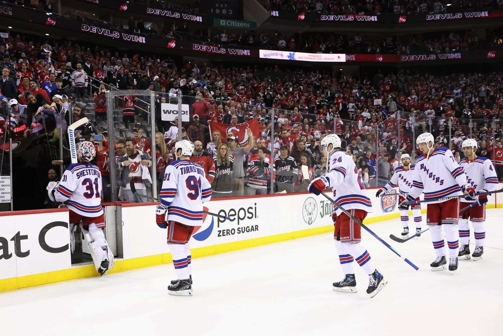 NEWARK, NEW JERSEY - MAY 01: The New York Rangers leave the ice following a series losing loss to the New Jersey Devils in Game Seven of the First Round of the 2023 Stanley Cup Playoffs at Prudential Center on May 01, 2023 in Newark, New Jersey. (Photo by Bruce Bennett/Getty Images)