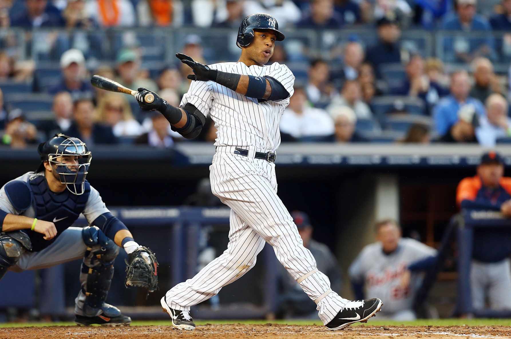 NEW YORK, NY - OCTOBER 14: (NEW YORK DAILIES OUT) Robinson Cano #24 of the New York Yankees in action against the Detroit Tigers during Game Two of the American League Championship Series at Yankee Stadium on October 14, 2012 in the Bronx borough of New York City, New York.. The Tigers defeated the Yankees 3-0. (Photo by Jim McIsaac/Getty Images)