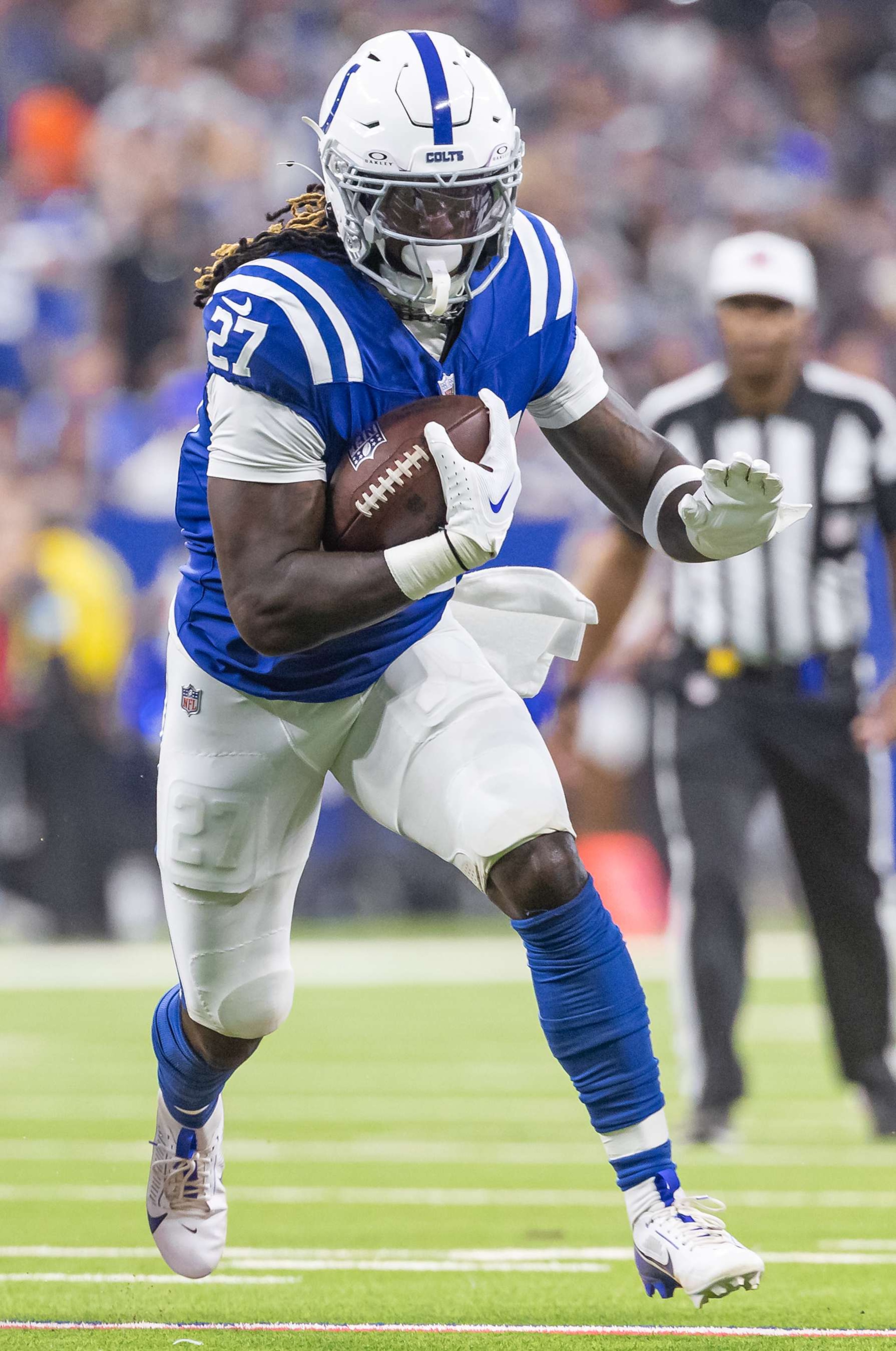 INDIANAPOLIS, INDIANA - SEPTEMBER 22: Trey Sermon #27 of the Indianapolis Colts runs the ball during the game against the Chicago Bears at Lucas Oil Stadium on September 22, 2024 in Indianapolis, Indiana. (Photo by Michael Hickey/Getty Images)