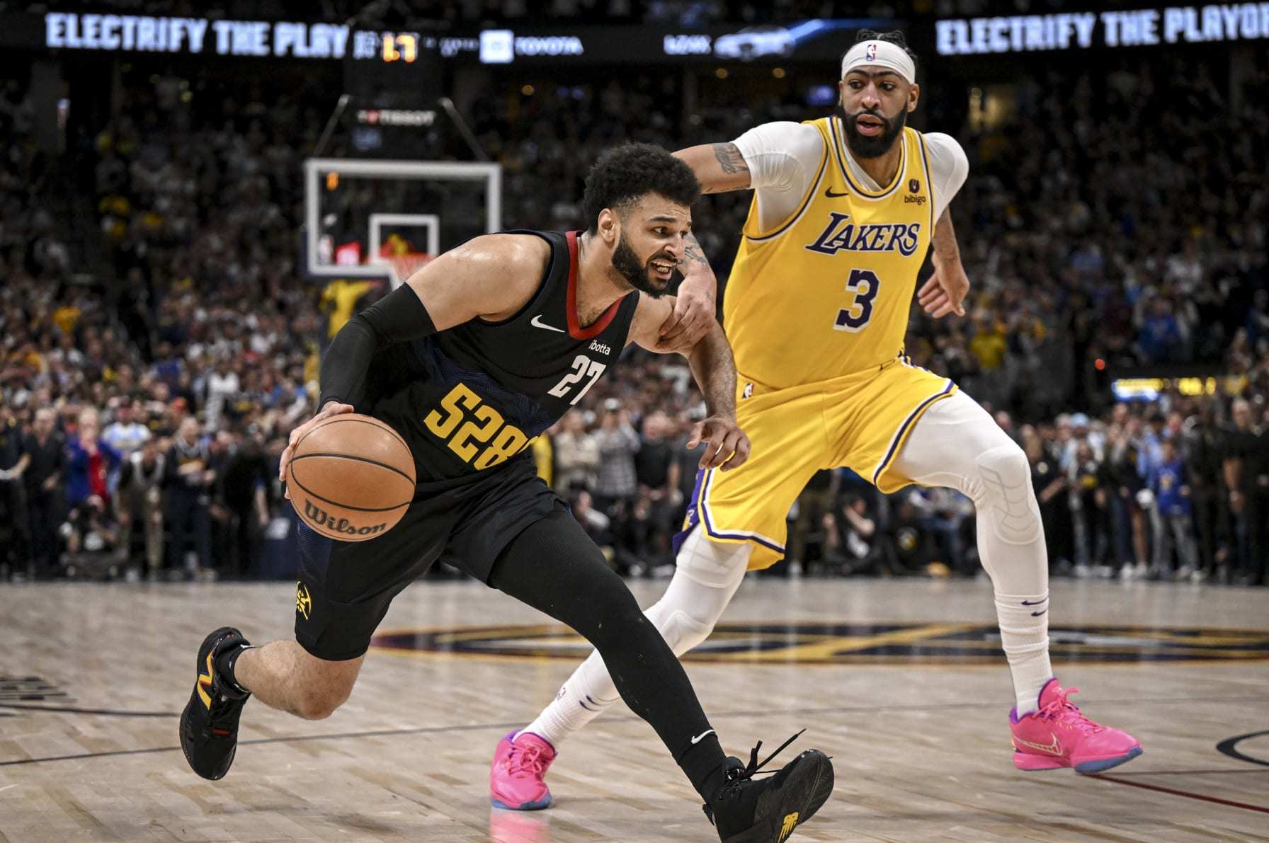 DENVER, CO - APRIL 22: Jamal Murray (27) of the Denver Nuggets takes a step before stepping back and hitting the game-winning shot over Anthony Davis (3) of the Los Angeles Lakers during the fourth quarter of the Nuggets' 101-99 win at Ball Arena in Denver on Monday, April 22, 2024. (Photo by AAron Ontiveroz/The Denver Post)