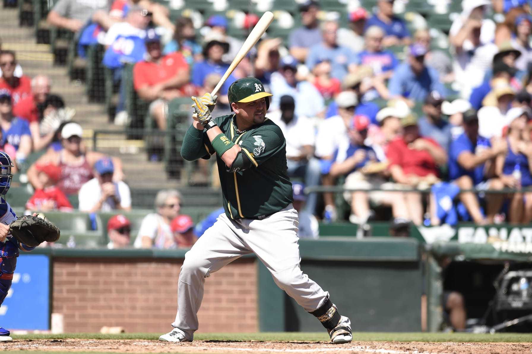 ARLINGTON, TX - SEPTEMBER 13: Billy Butler #16 of the Oakland Athletics bats against the Texas Rangers at Globe Life Park in Arlington on September 13, 2015 in Arlington, Texas. The Texas Rangers defeated the Oakland Athletics 12-4. (Photo by John Williamson/MLB Photos via Getty Images)