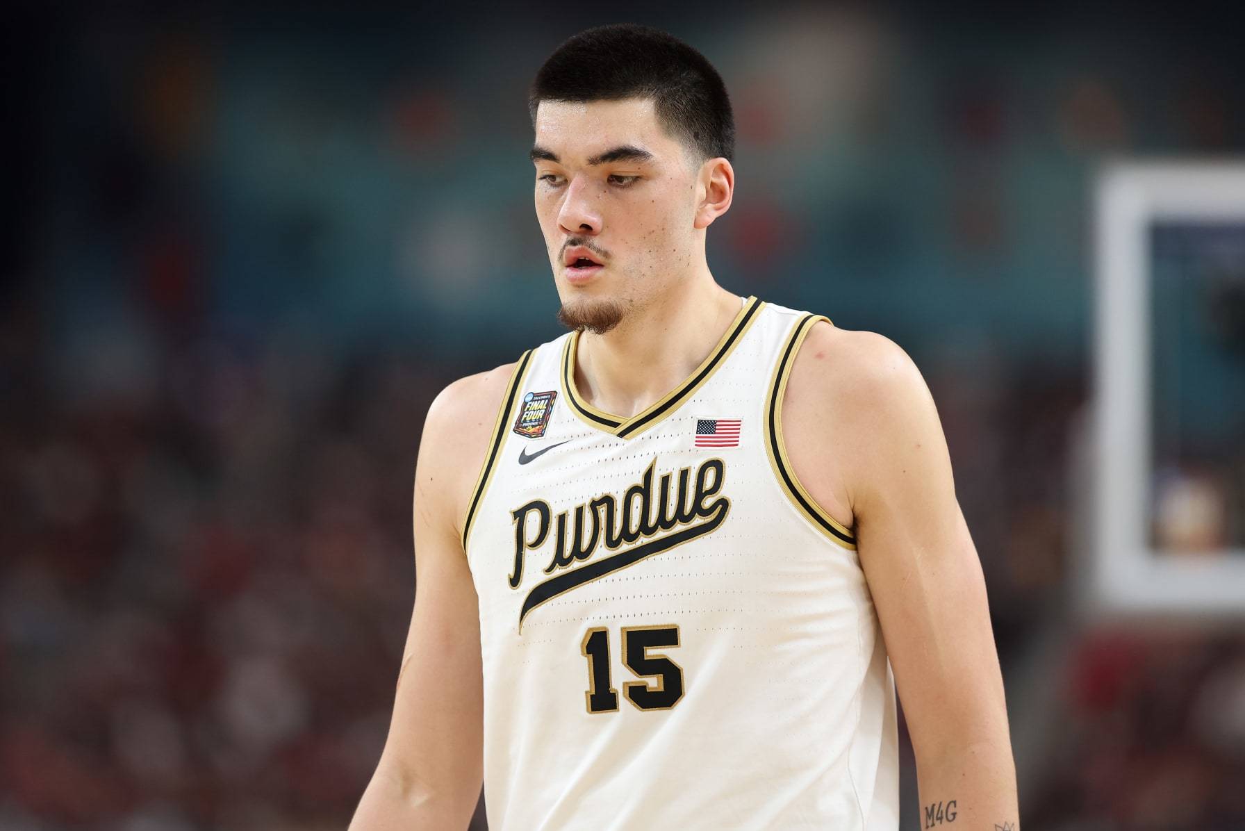 GLENDALE, ARIZONA - APRIL 06: Zach Edey #15 of the Purdue Boilermakers walks across the court in the first half against the North Carolina State Wolfpack  in the NCAA Men's Basketball Tournament Final Four semifinal game at State Farm Stadium on April 06, 2024 in Glendale, Arizona. (Photo by Christian Petersen/Getty Images)